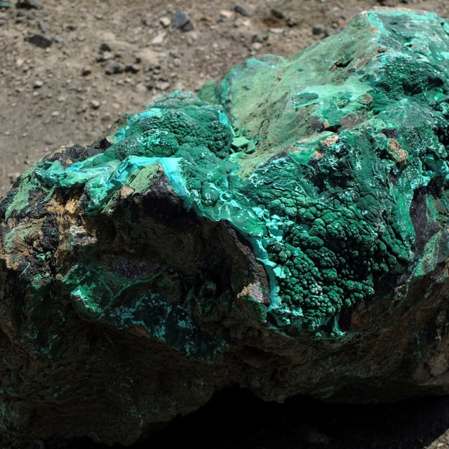 Piece of malachite, a copper ore, is seen at the bottom of Congolese state mining company Gecamines' Kamfundwa open pit copper mine.