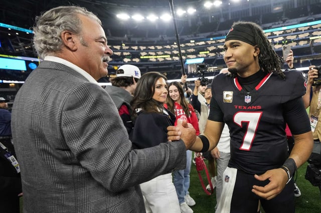 Houston Texans CEO Cal McNair, left, shakes hands with Houston Texans quarterback C.J. Stroud (7) as they celebrate the Texans 34-10 win over the Dallas Cowboys in an NFL football game at AT&amp;T Stadium, Monday, Nov. 18, 2024, in Arlington.