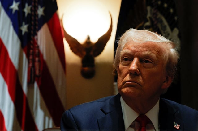 U.S. President Donald Trump hosts his first cabinet meeting at the White House in Washington, D.C., U.S., February 26, 2025. REUTERS/Brian Snyder