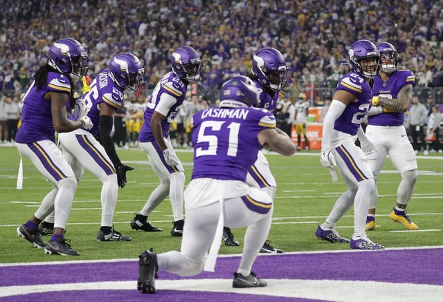 Dec 29, 2024; Minneapolis, Minnesota, USA; Minnesota Vikings safety Camryn Bynum (24) celebrates recovering a fumble by Green Bay Packers running back Josh Jacobs (8) in the first quarter at U.S. Bank Stadium. Mandatory Credit: Dan Powers/USA TODAY NETWORK-Wisconsin via Imagn Images/File Photo