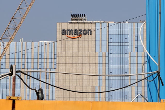 An Amazon logo is seen on the facade of its corporate office building in Hyderabad, India, January 29, 2025. REUTERS/Almaas Masood/File photo