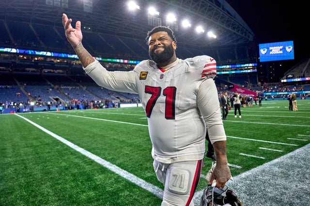 Offensive tackle Trent Williams #71 of the San Francisco 49ers celebrates with fans after the game at Lumen Field on October 10, 2024 in Seattle, Washington.
