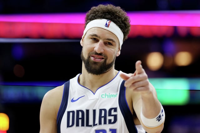 Klay Thompson of the Dallas Mavericks points at a fan during the second half of the game against the Philadelphia 76ers at the Wells Fargo Center on Feb. 4, 2025, in Philadelphia.