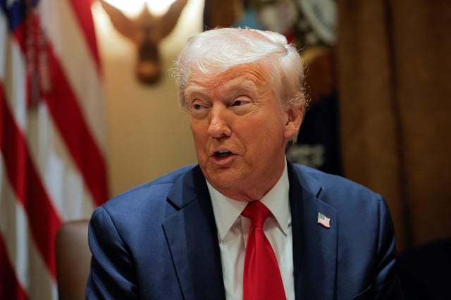 U.S. President Donald Trump hosts his first cabinet meeting with Elon Musk in attendance, Washington, D.C.,  U.S., February 26, 2025. REUTERS/Brian Snyder