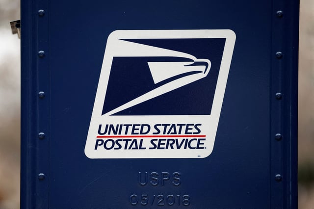 A United States Postal Service (USPS) collection box is pictured in Washington, U.S., December 18, 2024. REUTERS/Benoit Tessier/File Photo