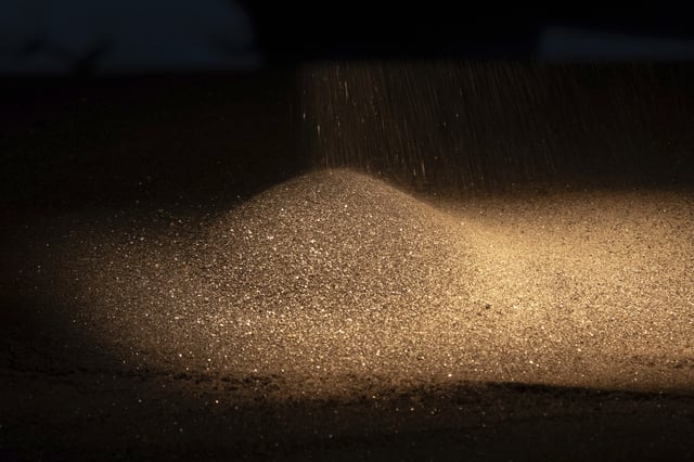 FILE - Ilmenite, a key element used to produce titanium, is collected in the country's leading titanium mining company in the central region of Kirovohrad, Ukraine, Feb. 12, 2025. (AP Photo/Efrem Lukatsky, File)
