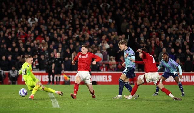 Soccer Football - Premier League - Nottingham Forest v Arsenal - The City Ground, Nottingham, Britain - February 26, 2025 Nottingham Forest's Matz Sels in action as he makes a save from Arsenal's Martin Odegaard REUTERS/Chris Radburn