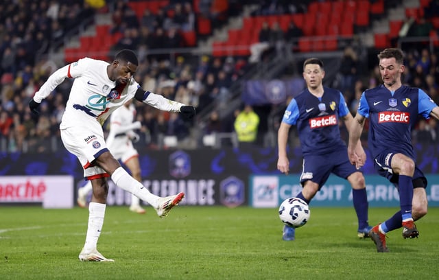 Soccer Football - Coupe de France - Quarter Final - Stade Briochin v Paris St Germain - Roazhon Park, Rennes, France - February 26, 2025 Paris St Germain's Ousmane Dembele scores their seventh goal REUTERS/Stephane Mahe