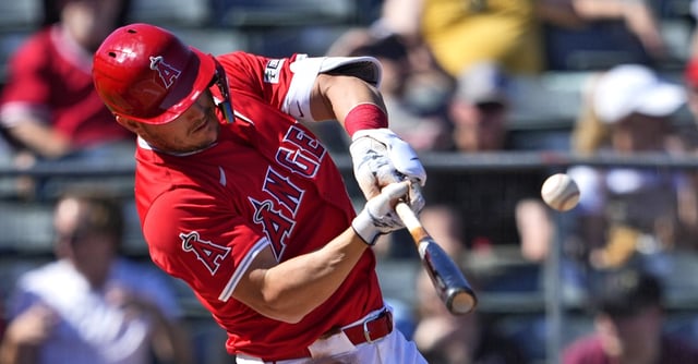 Angels star Mike Trout connects for a solo home run during the third inning of their Cactus League game against the Cincinnati Reds on Wednesday in Tempe, Ariz. (AP Photo/Matt York)