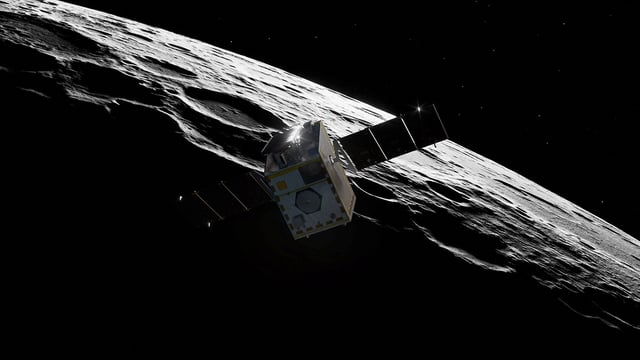 An illustration shows NASA’s Lunar Trailblazer approaching the moon as it enters its science orbit in this artist’s concept. The small satellite will orbit about 60 miles (100 kilometers) above the lunar surface, producing the best maps of water on the moon to date. Lockheed Martin Space/Handout via REUTERS