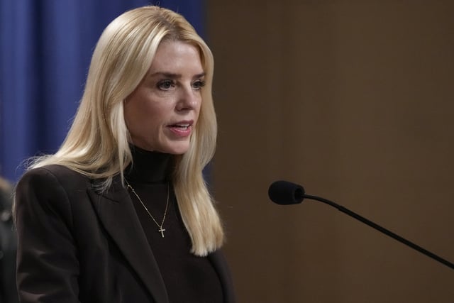 Attorney General Pam Bondi speaks at a news conference regarding immigration enforcement at the Justice Department, Wednesday, Feb. 12, 2025, in Washington. (AP Photo/Ben Curtis)