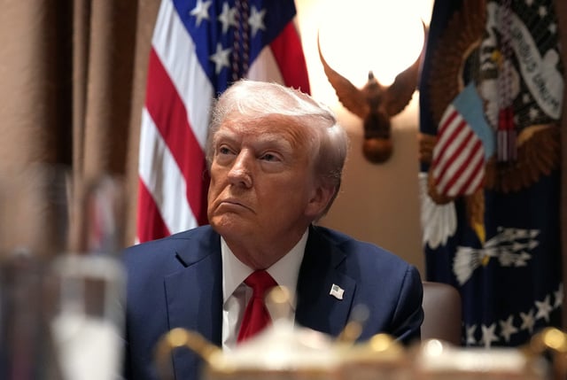 WASHINGTON, DC - FEBRUARY 26: U.S. President Donald Trump listens during a Cabinet meeting at the White House on February 26, 2025 in Washington, DC. Trump is holding the first Cabinet meeting of his second term, joined by Tesla and SpaceX CEO Elon Musk, head of the Department of Government Efficiency (DOGE). (Photo by Andrew Harnik/Getty Images)