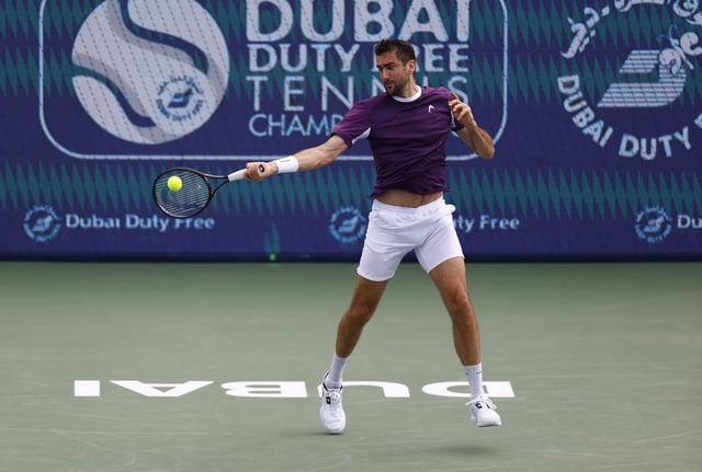 Tennis - Dubai Championships - Dubai Tennis Stadium, Dubai, United Arab Emirates - February 26, 2025 Croatia's Marin Cilic in action during his round of 16 match against Australia's Alexei Popyrin REUTERS/Rula Rouhana