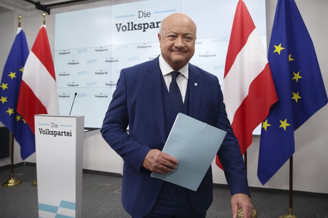 Head of Austrian Peoples' Party (OeVP) Christian Stocker leaves a news conference in Vienna, Austria, Wednesday, Feb 12, 2025. (AP Photo/Heinz-Peter Bader)