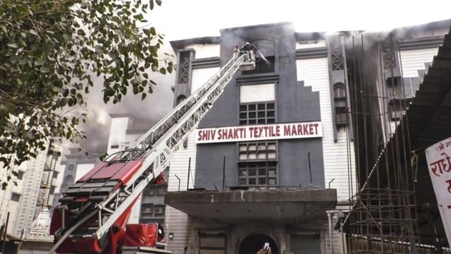 Around 450 shops have been severely destroyed in the market that houses over 850 shops and provided employment to around 5,000 people, police said. (PTI)