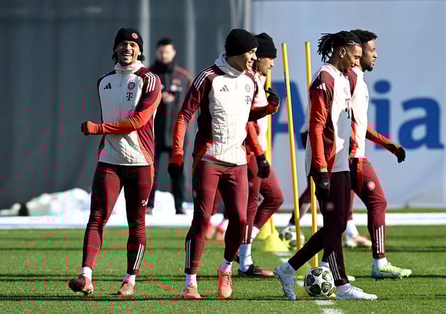 Soccer Football - Champions League - Knockout Phase Playoff - Second Leg - Bayern Munich Training - Saebener Strasse, Munich, Germany - February 17, 2025 Bayern Munich's Leroy Sane with Jamal Musiala and Michael Olise during training REUTERS/Angelika Warmuth/File Photo