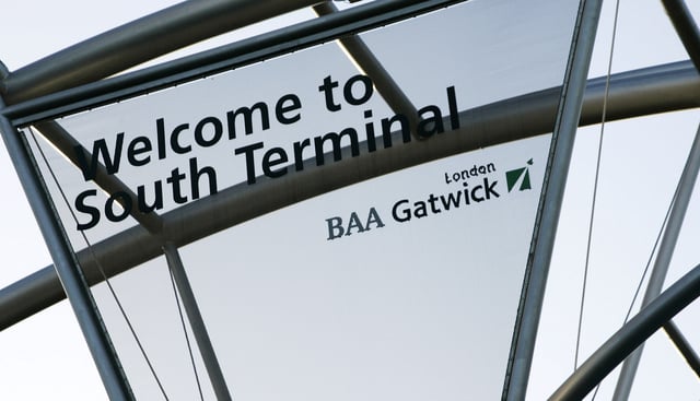FILE -A sign for the South Terminal is seen at London's Gatwick airport, Dec. 17, 2008. (AP Photo/Sang Tan, File)