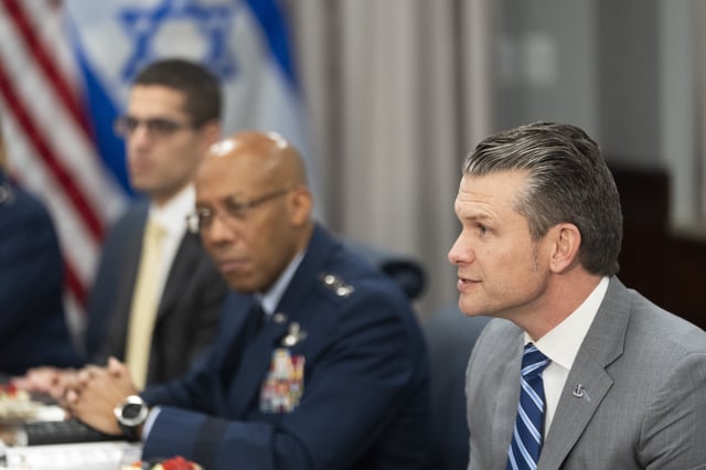 Secretary of Defense Pete Hegseth, from right, with Chairman of the Joint Chiefs of Staff Gen. CQ Brown gives his opening statement before the start of their meeting with Israeli Prime Minister Benjamin Netanyahu at the Pentagon, Wednesday, Feb. 5, 2025, in Washington. (AP Photo/Manuel Balce Ceneta)
