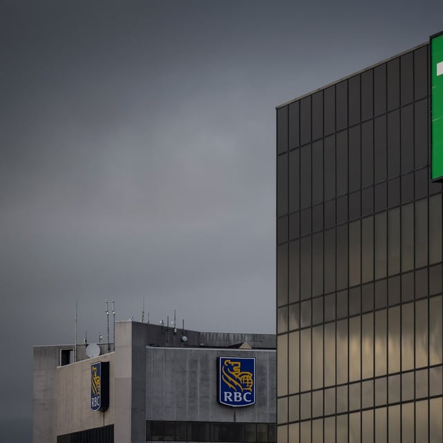 TD Canada Trust and RBC Royal Bank logos are seen on the outside of office towers in downtown Vancouver, on Thursday, January 19, 2023.