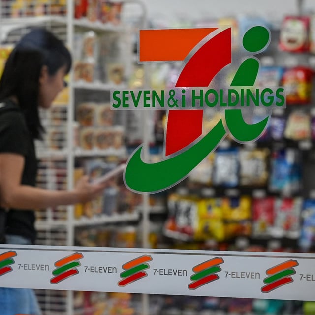 (FILES) A customer is seen inside a 7-Eleven convenience store along a street in central Tokyo on September 9, 2024. Shares in the Japanese owner of 7-Eleven plunged 12 percent on February 27, 2025 after reports said a bid by the convenience store giant's founding family to go private had failed. (Photo by Richard A. Brooks / AFP) (Photo by RICHARD A. BROOKS/AFP via Getty Images)