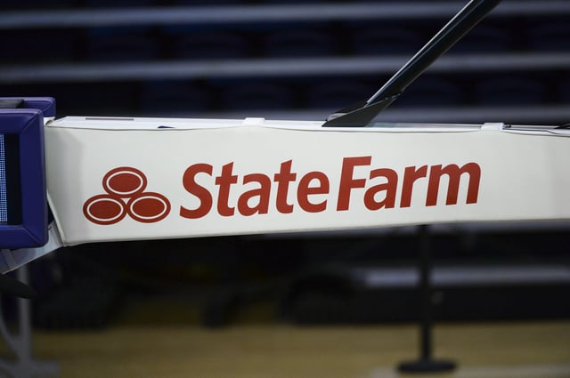 A State Farm ad is seen on the basket during a PAC12 womens basketball game between the Stanford Cardinal and the Washington Huskies on January 31, 2021 at Hec Edmundson Pavilion in Seattle, WA.