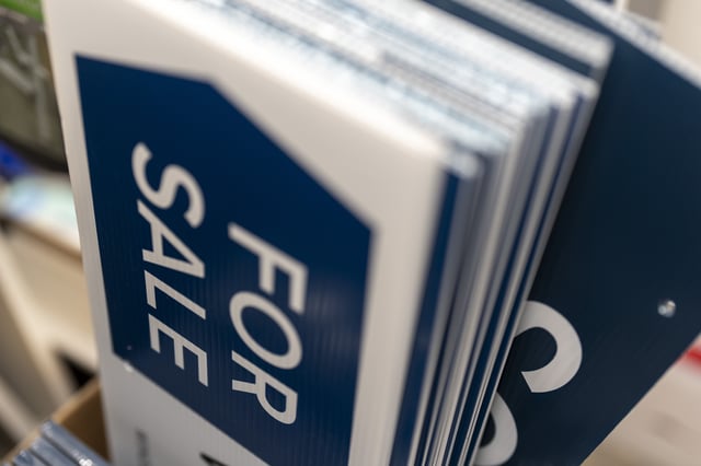 FILE - For sale and sold signs are seen in storage at a real estate office on Tuesday, Oct. 15, 2024, in Portland, Ore. (AP Photo/Jenny Kane, File)
