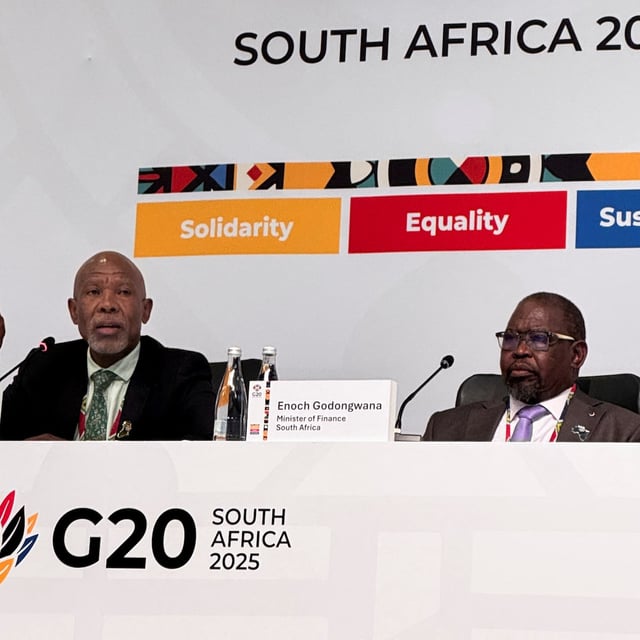 Lesetja Kganyago, Governor of the South African Reserve Bank, and South African Finance Minister Enoch Godongwana speak with the media about G20 meetings in Cape Town, South African February 27, 2025. REUTERS/Sisipho Skweyiya