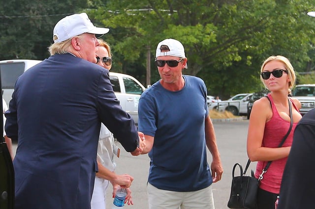 FILE -  Donald Trump shakes hands with former NHL star Wayne Gretzky before leaving The Barclays at Plainfield Country Club in Edison, N.J. 