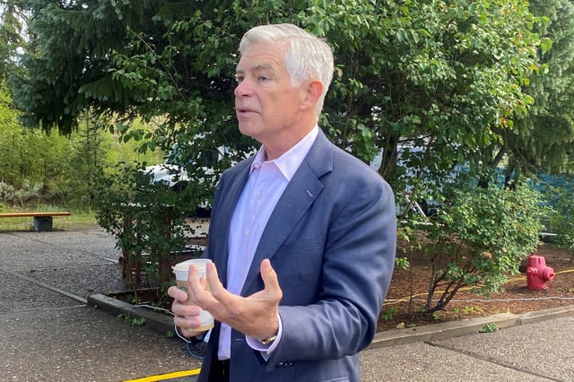 Philadelphia Federal Reserve Bank President Patrick Harker speaks with CNBC's Steve Liesman (not pictured) after an interview ahead of the annual Kansas City Fed Economic Policy Symposium, in Jackson Hole, Wyoming, U.S., August 25, 2022. REUTERS/Ann Saphir/File Photo