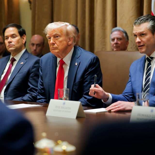 President Donald Trump listens during a Cabinet meeting at the White House in Washington, Tuesday, Feb. 26, 2025, as Secretary of State Marco Rubio and Defense Secretary Pete Hegseth listen. (Pool via AP)