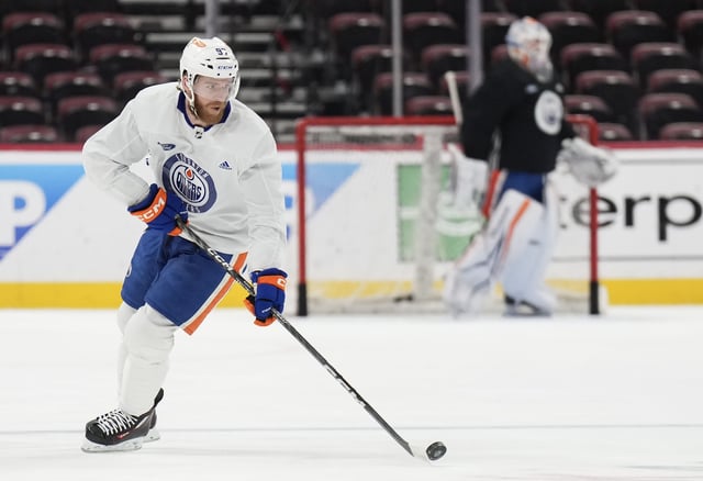 Edmonton Oilers forward Connor McDavid handles the puck in a drill during practice before taking on the Florida Panthers tomorrow night in Game 7 of the NHL Stanley Cup finals in Sunrise, Fla., on Sunday, June 23, 2024. 