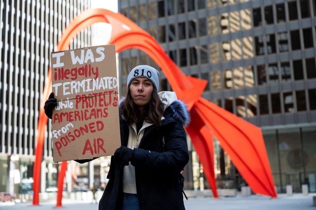 Nicole Smith, an Environmental Protection Agency employee who had worked at the agency for two months before being fired, poses for a portrait while attending a rally in support of fired EPA probationary employees, at Federal Plaza in Chicago, on Feb. 18, 2025.