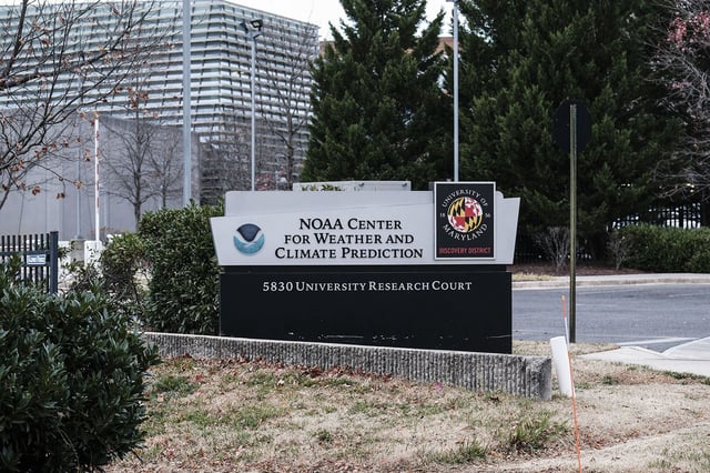 Signage outside the National Oceanic and Atmospheric Administration (NOAA) Center for Weather and Climate Prediction headquarters in College Park, Maryland, US, on Thursday, Dec. 5, 2024. The conservative Project 2025 roadmap calls for slashing NOAA funding at a time when China is investing heavily in climate research. Photographer: Michael A. McCoy/Bloomberg via Getty Images