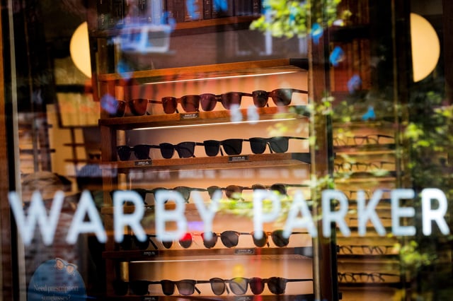 Glasses are seen inside of a Warby Parker store in Brooklyn, New York on June 24, 2021.