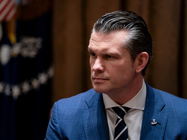 Pete Hegseth, US secretary of defense, during a cabinet meeting at the White House in Washington, DC, US, on Wednesday, Feb. 26, 2025. Elon Musk's demand that more than two million federal employees defend their work is facing pushback from other powerful figures in the Trump administration, in a sign that the billionaire's brash approach to overhauling the government is creating division. Photographer: Al Drago/Bloomberg via Getty Images