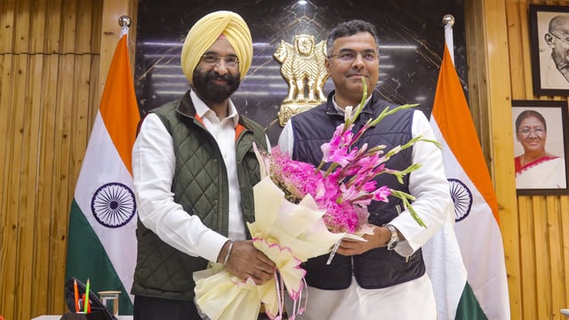 Delhi minister Parvesh Verma is being greeted by minister Manjinder Singh Sirsa as the former takes charge of his office at Delhi Secretariat, in New Delhi, Tuesday, Feb. 25, 2025. Verma has been allotted the departments of PWD, Water, Legislative Affairs, Irrigation and Flood Control, and Gurdwara Elections.