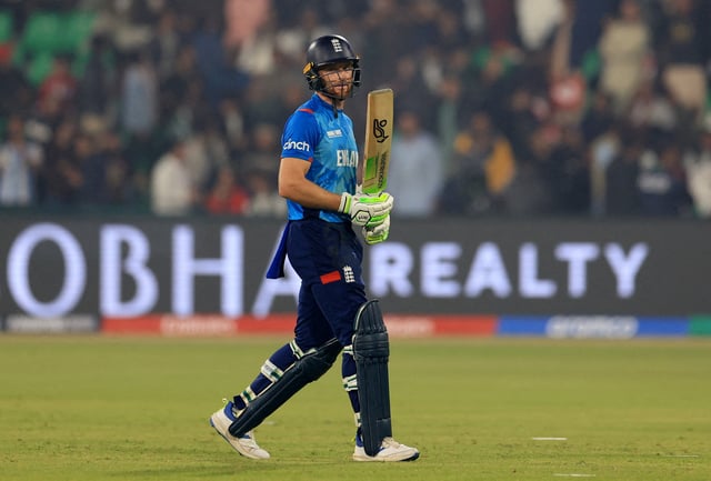 Cricket - ICC Men's Champions Trophy - Group B - England v Afghanistan - Gaddafi Stadium, Lahore, Pakistan - February 26, 2025 England's Jos Buttler walks off after being caught by Afghanistan's Rahmat Shah off the bowling of Azmatullah Omarzai REUTERS/Akhtar Soomro/File Photo