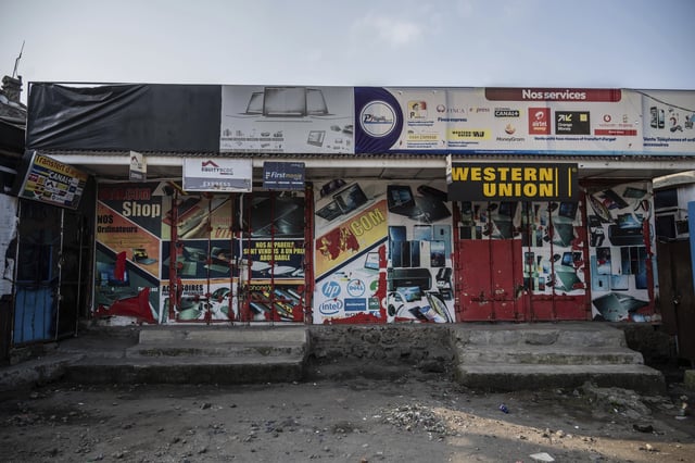 Shops are closed in downtown Goma, Democratic Republic of Congo, Thursday, Feb. 27, 2025, one month after Rwanda-backed M23 rebels captured the city. (AP Photo/Moses Sawasawa)