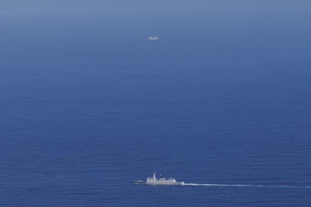 The Chinese navy frigate CNS Hengyang, front, and replenishment ship CNS Weishanhu transit the Coral Sea northeast of Australia on February 15, 2025.
