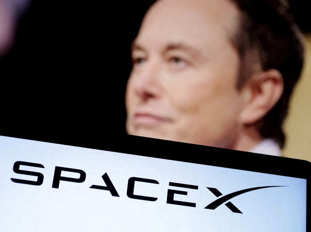 SpaceX logo and Elon Musk photo are seen in this illustration taken, December 19, 2022. REUTERS/Dado Ruvic/Illustration/File Photo