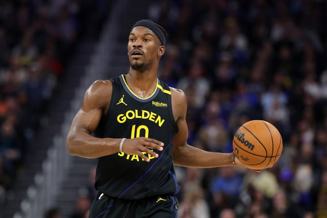 SAN FRANCISCO, CALIFORNIA - FEBRUARY 25: Jimmy Butler III #10 of the Golden State Warriors dribbles the ball against the Charlotte Hornets at Chase Center on February 25, 2025 in San Francisco, California.
