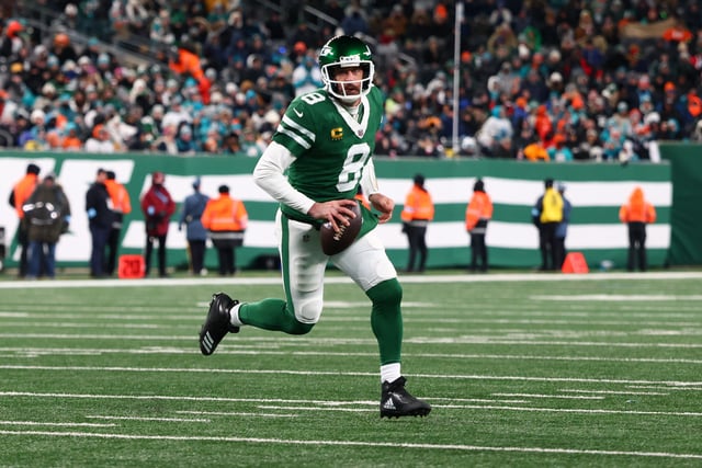 Jan 5, 2025; East Rutherford, New Jersey, USA; New York Jets quarterback Aaron Rodgers (8) runs with the ball during the third quarter of their game against the Miami Dolphins at MetLife Stadium. Mandatory Credit: Ed Mulholland-Imagn Images/File Photo
