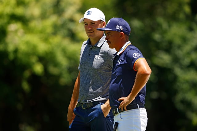 Jordan Spieth of the United States talks to Rickie Fowler of the United States on the fifth hole during the first round of the Charles Schwab Challenge on June 11, 2020 at Colonial Country Club in Fort Worth, Texas.
