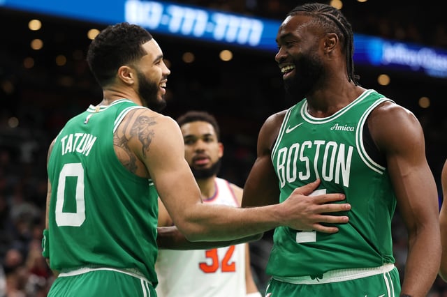 Jayson Tatum #0 of the Boston Celtics and Jaylen Brown #7 laugh together during the second half of the game against the New York Knicks at TD Garden on February 23, 2025 in Boston, Massachusetts. The Celtics defeat the Knicks 118-105.