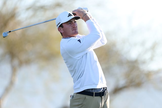 SCOTTSDALE, ARIZONA - FEBRUARY 06: Nick Dunlap of the United States plays his shot from the 12th tee during the first round of the WM Phoenix Open 2025 at TPC Scottsdale on February 06, 2025 in Scottsdale, Arizona.