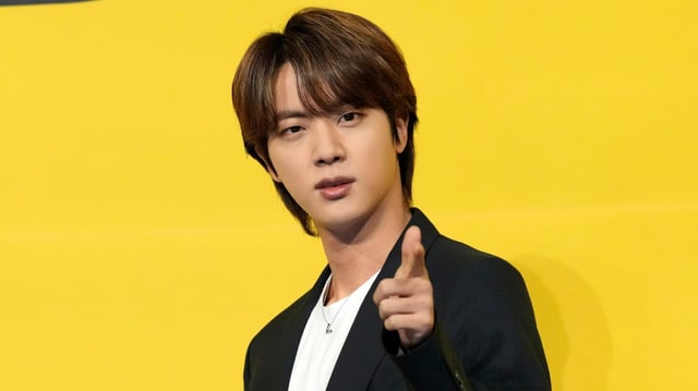 Kim Seok-jin, of the South Korean pop band BTS, hosted a hugathon to mark the end of his military service