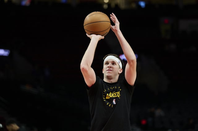 Feb 20, 2025; Portland, Oregon, USA; Los Angeles Lakers guard Austin Reaves (15) warms up before a game against the Portland Trail Blazers at Moda Center. Mandatory Credit: Troy Wayrynen-Imagn Images/File Photo