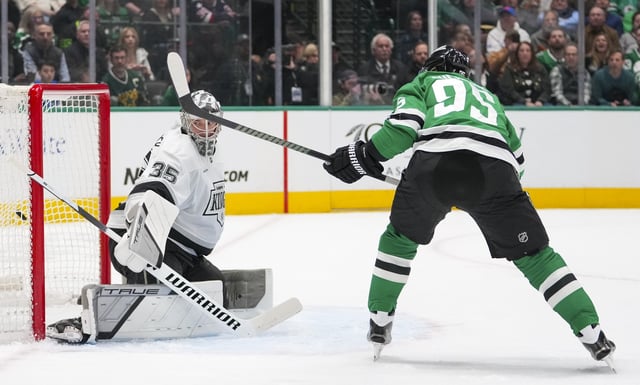 Dallas Stars center Matt Duchene, right, scores a goal past Kings goaltender Darcy Kuemper during the first period on Friday night in Dallas. The Stars scored three goals in the first period on their way to a 6-2 win. (AP Photo/Julio Cortez)