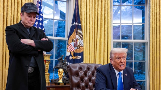 Elon Musk listens as US President Donald Trump speaks in the Oval Office of the White House.