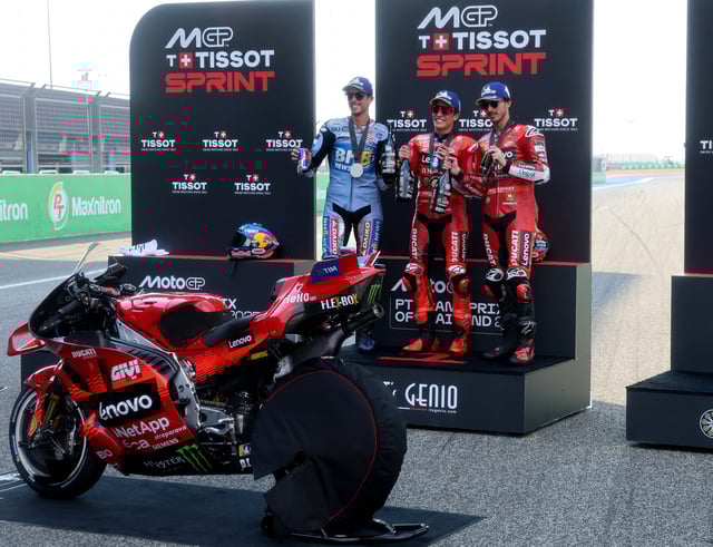MotoGP - Thailand Grand Prix - Chang International Circuit, Buriram, Thailand - March 1, 2025 Ducati Lenovo Team's Marc Marquez celebrates after winning the MotoGP sprint along with second placed Gresini Racing MotoGP's Alex Marquez and third placed Ducati Lenovo Team's Francesco Bagnaia REUTERS/Athit Perawongmetha